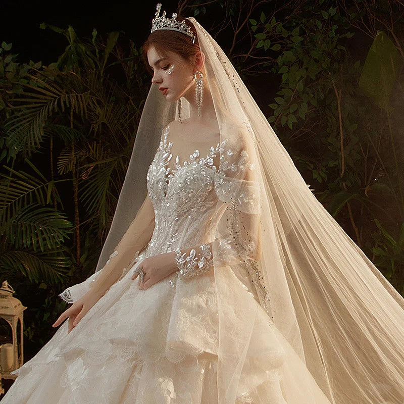 O-Neck Illusion Long Sleeve Brilliant Embroidery Lace Sequins Beading Bridal Gowns With Train