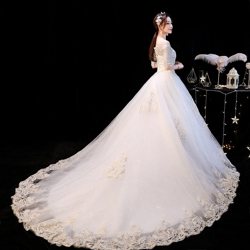 Elegant Boat Neck Sweep Train Princess Wedding Gowns Champagne Lace