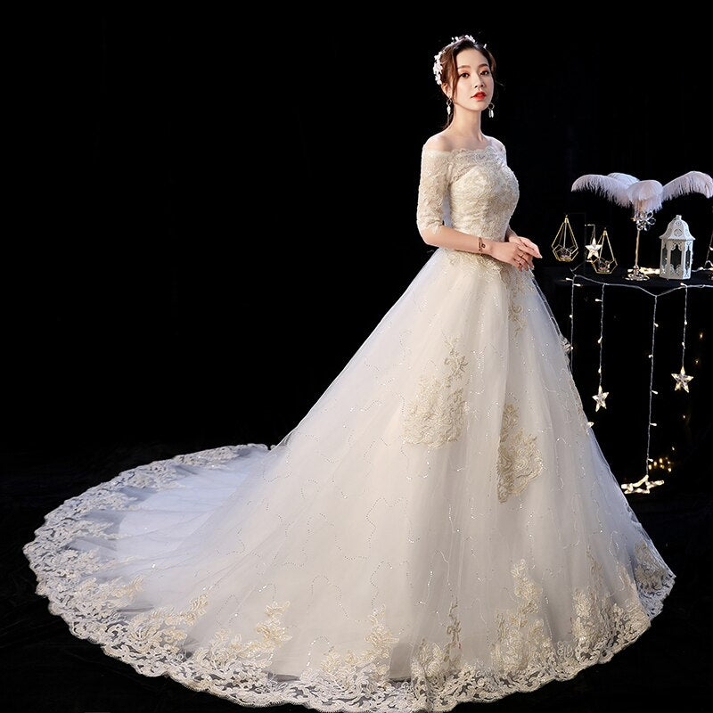 Elegant Boat Neck Sweep Train Princess Wedding Gowns Champagne Lace
