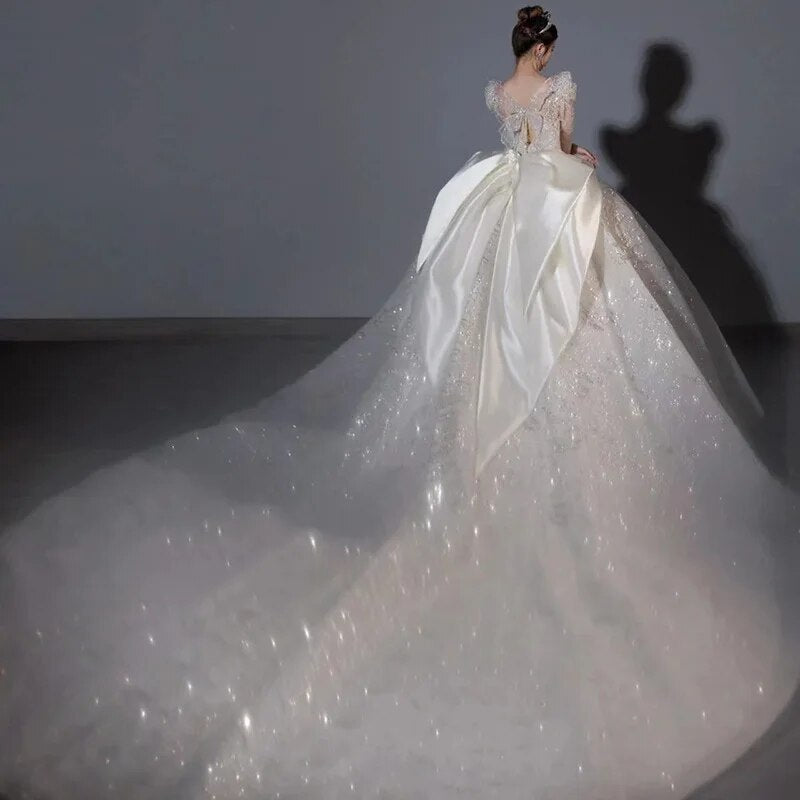 Long Sleeved Bridal Dress Back Up Bow Sweep Train Beading Wedding Gown V-neck
