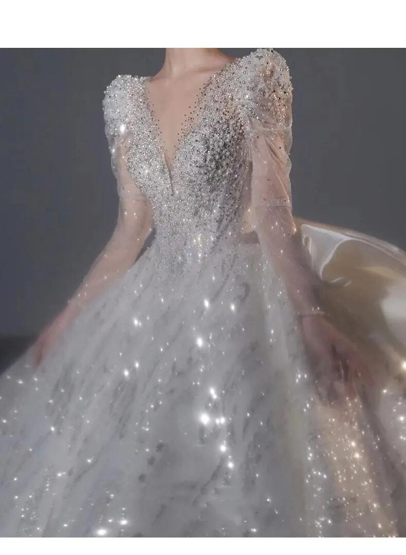 Long Sleeved Bridal Dress Back Up Bow Sweep Train Beading Wedding Gown V-neck