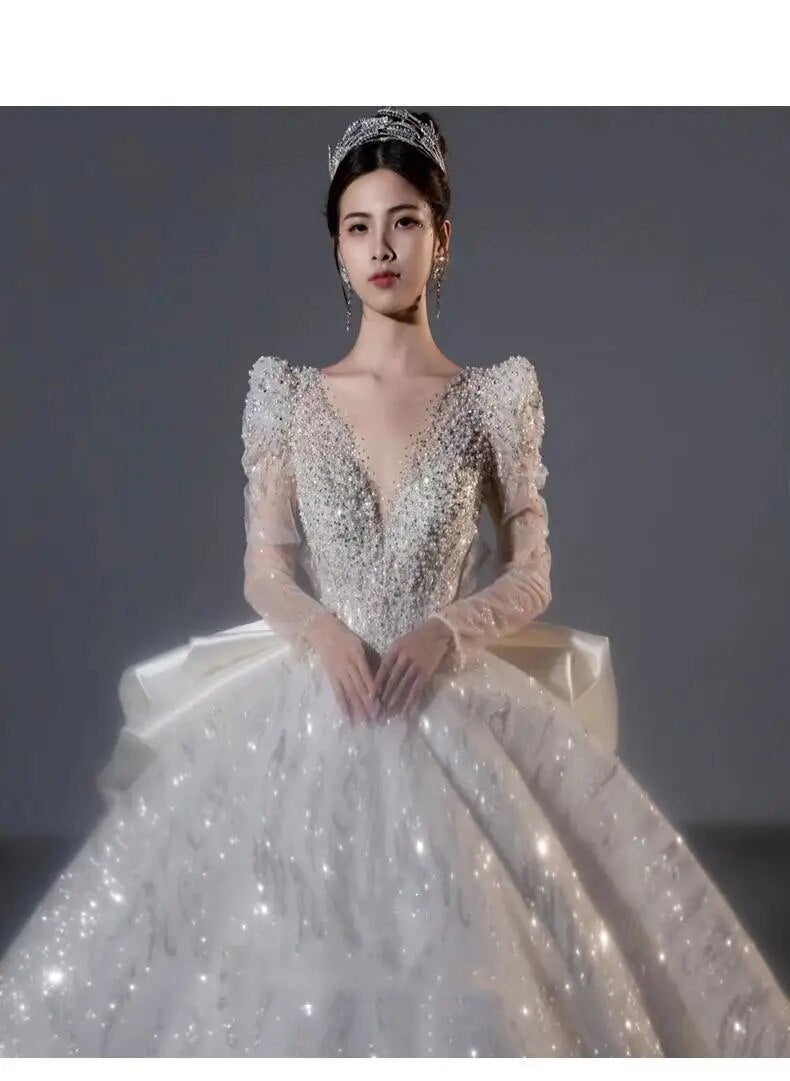 Long Sleeved Bridal Dress Back Up Bow Sweep Train Beading Wedding Gown V-neck