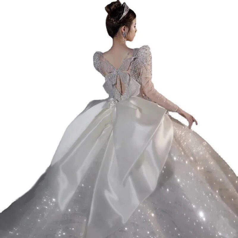Long Sleeved Bridal Dress Back Up Bow Sweep Train Beading Wedding Gown V-neck