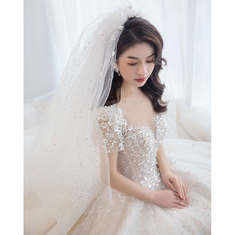 Luxury Short Sleeve Wedding Dress 2023 New Bridal Dress V Neck Beading Shinning Ball Gown Sweep Train