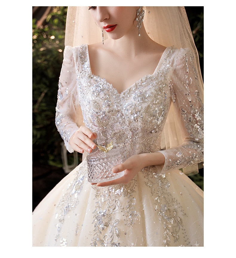 Luxury Long Sleeve Boat-neck Sweep Train Lace Up Gown