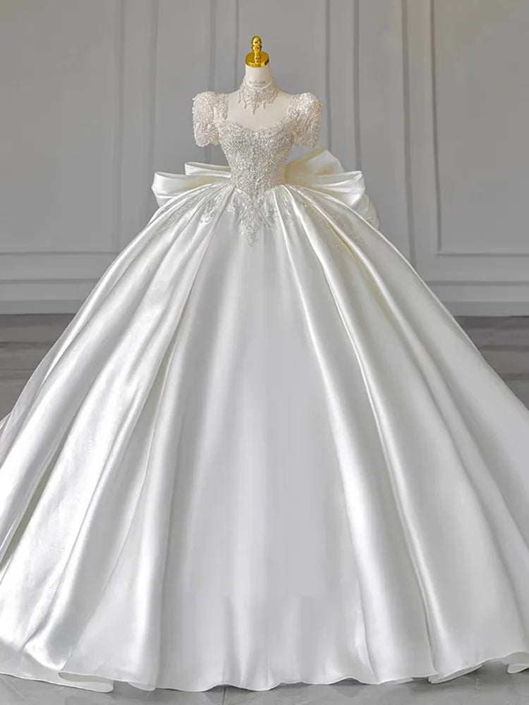 White Satin Sequins With Bow Ball Gown