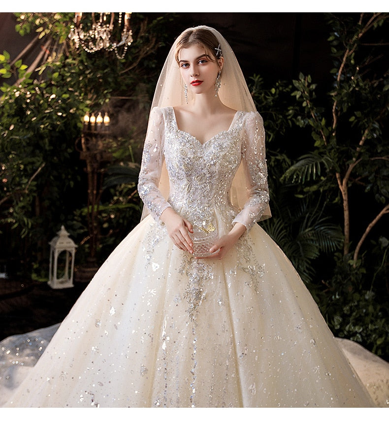 Luxury Long Sleeve Boat-neck Sweep Train Lace Up Gown