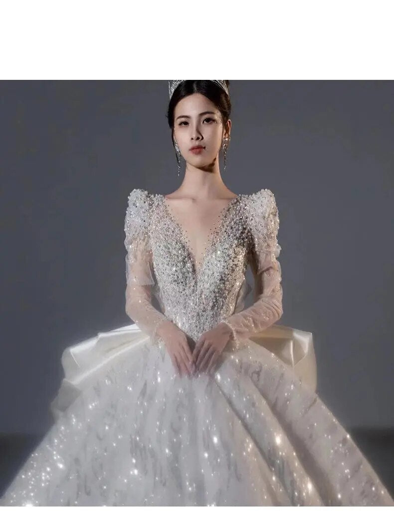 Long Sleeved Bridal Dress Back Up Bow Sweep Train Beading Wedding Gown V-neck