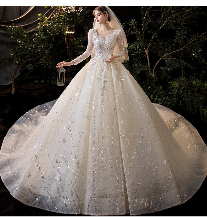 Luxury Long Sleeve Boat-neck Sweep Train Lace Up Gown