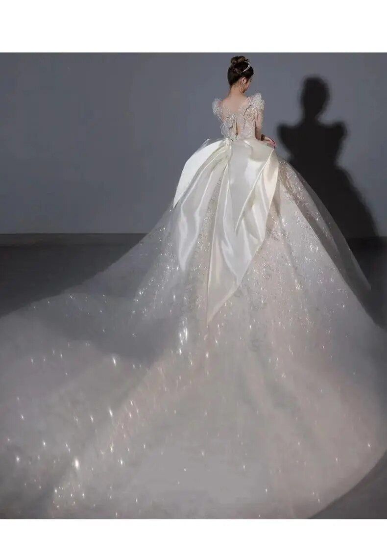 Long Sleeved Bridal Dress Back Up Bow Sweep Train Beading Wedding Gown V-neck