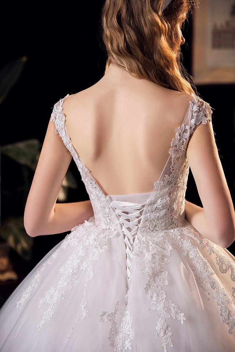Lace V-neck Sweep Train Wedding Gowns Sleeveless Embroidery Bridal Dress