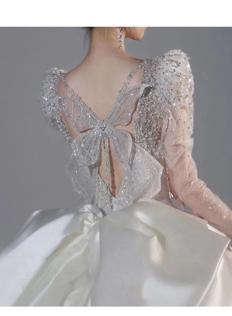 Long Sleeved Bridal Dress Back Up Bow Sweep Train Beading Wedding Gown V-neck