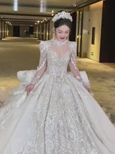 Load and play video in Gallery viewer, Retro Exquisite Long Sleeves Vintage Lace Appliques Beading Bridal Gown
