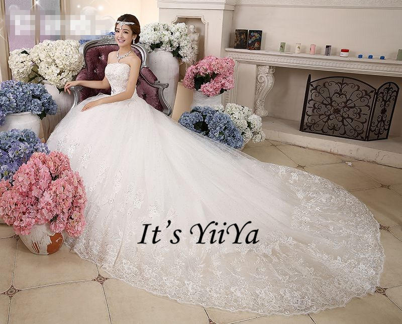 Free shipping 2017 New Bling Strapless Sequins Wedding Dresses White Beading Gowns Princess Bride Frocks Plus size XXN053
