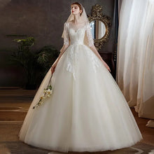 Load image into Gallery viewer, Classic O Neck Wedding Dress Beautiful Lace Princess Ball Gown Slim Half Sleeve Bridal Dress
