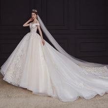 Load image into Gallery viewer, Luxury Handmade Boat Neck Wedding Dress With Train Lace Flower Bridal Dress Elegant Off The Shoulder Ball Gown Robe De Mariee
