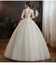 Load image into Gallery viewer, Classic O Neck Wedding Dress Beautiful Lace Princess Ball Gown Slim Half Sleeve Bridal Dress
