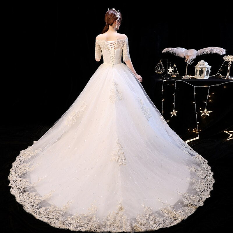 Elegant Boat Neck Sweep Train Princess Wedding Gowns Champagne Lace