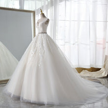 Load image into Gallery viewer, Champagne Wedding Dress With Trian Sexy V-neck Bridal Dress Backless Ball Gown
