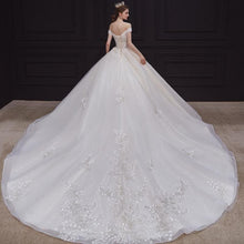Load image into Gallery viewer, Luxury Handmade Boat Neck Wedding Dress With Train Lace Flower Bridal Dress Elegant Off The Shoulder Ball Gown Robe De Mariee
