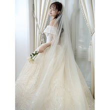 Load image into Gallery viewer, Shining Sequins Luxury Wedding Dress With Sweep Train Elegant Boat Neck Off The Shoulder Ball Gown
