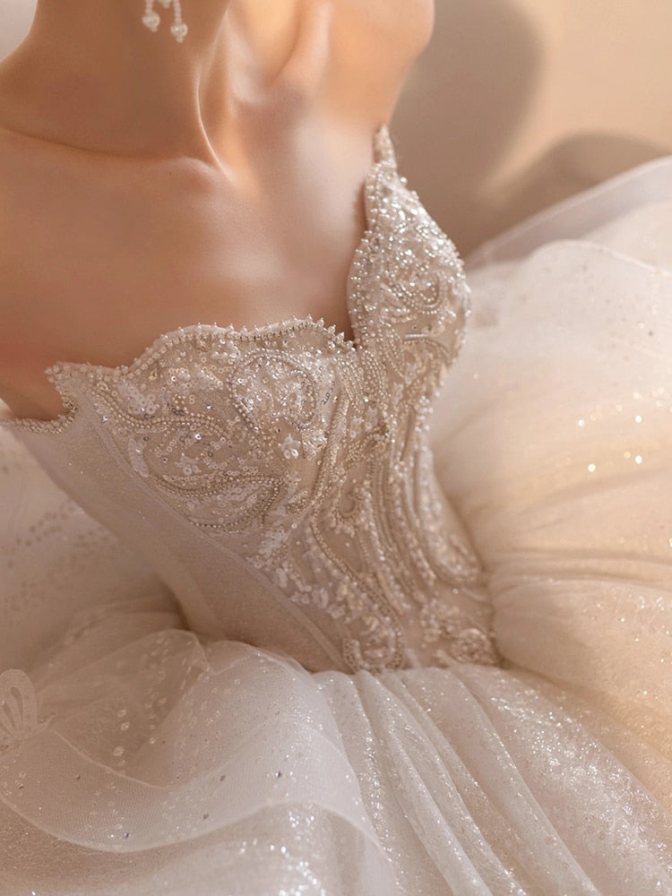 Luxury Sling Wedding Dress Boat Neck Glittery Pearls Lace Dress