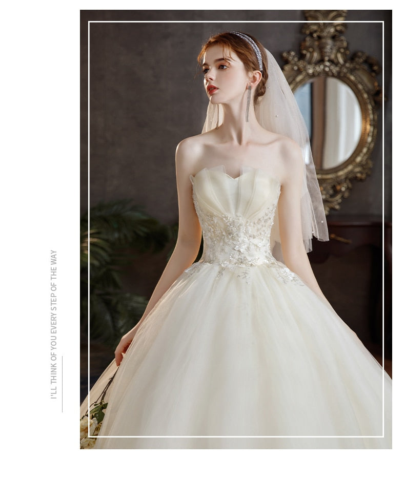 Elegant Strapless Wedding Dress Tulle Applique Lace Up Bridal Dress