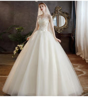 Load image into Gallery viewer, Elegant Strapless Wedding Dress Tulle Applique Lace Up Bridal Dress

