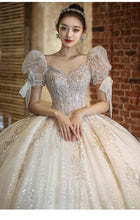 Load image into Gallery viewer, Luxury Beading Lace Wedding Dress 2023 V Neck Puff Sleeve Princess Wedding Gown With Big Sweep Train Plus Size Wedding Dress
