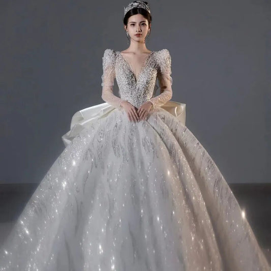 Long Sleeved Bridal Dress Back Up Bow Sweep Train Beading Wedding Gown V-neck