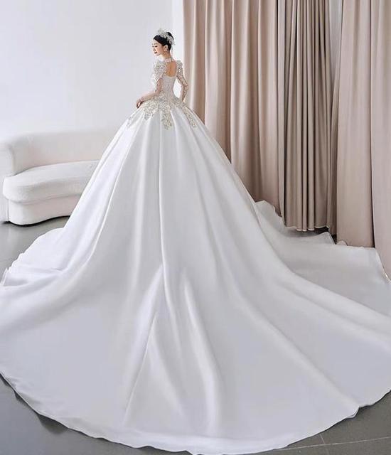 Sexy Backless Wedding Dresses Long Sleeve Satin V-neck Ball Gown