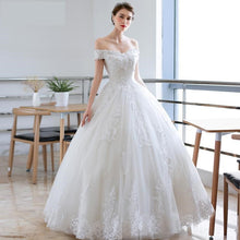 Load image into Gallery viewer, 2023 Off White Sexy Boat Neck Wedding Dress Beautiful Lace Flower Ball Gown Off The Shoulder Princess Bridal Dress Custom Made
