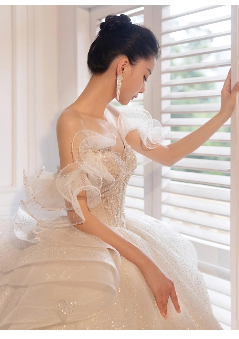 Luxury Sling Wedding Dress Boat Neck Glittery Pearls Lace Dress