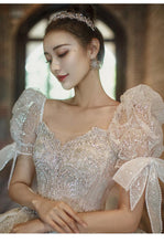 Load image into Gallery viewer, Luxury Beading Lace Wedding Dress 2023 V Neck Puff Sleeve Princess Wedding Gown With Big Sweep Train Plus Size Wedding Dress
