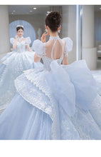 Load image into Gallery viewer, Snow Blue Princess Luxury Wedding Dress 2023 New O-neck Sexy Lace Up Applique Bridal Ball Gown Sweep
