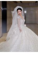 Load image into Gallery viewer, Luxury Glittery Long Sleeve Lace Up Bridal Dress
