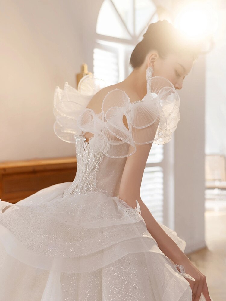 Luxury Sling Wedding Dress Boat Neck Glittery Pearls Lace Dress