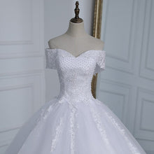 Load image into Gallery viewer, Off Shoulder Appliqes Pearls Long Train Bridal Gowns

