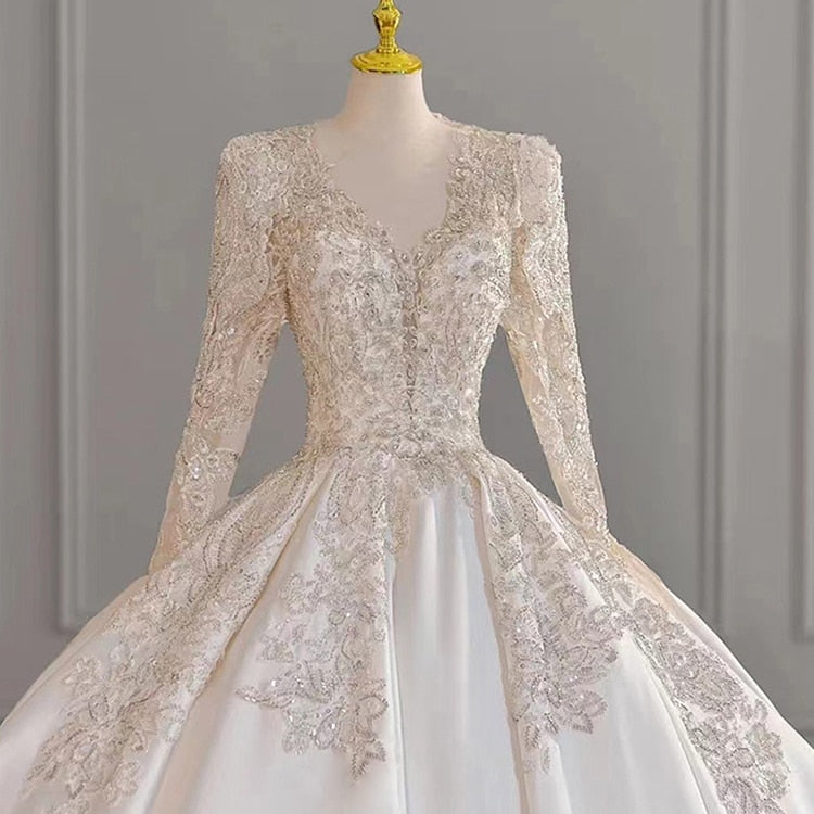 Sexy Backless Wedding Dresses Long Sleeve Satin V-neck Ball Gown