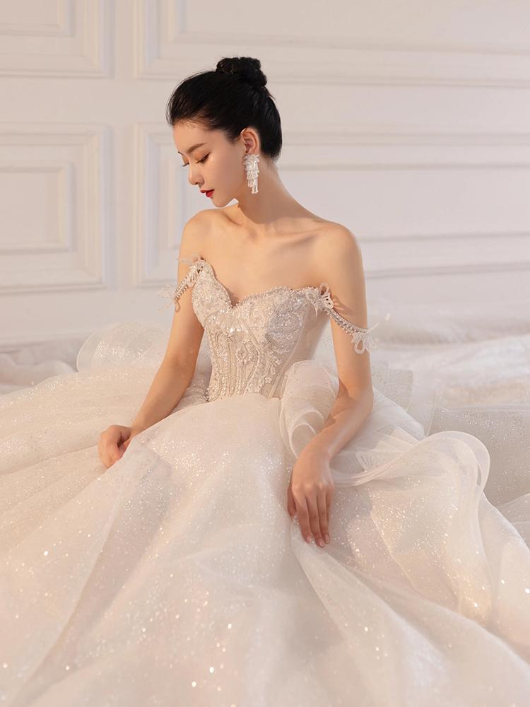 Luxury Sling Wedding Dress Boat Neck Glittery Pearls Lace Dress