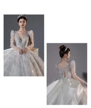 Load image into Gallery viewer, Long Sleeved Bridal Dress Back Up Bow Sweep Train Beading Wedding Gown V-neck
