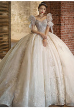 Load image into Gallery viewer, Luxury Beading Lace Wedding Dress 2023 V Neck Puff Sleeve Princess Wedding Gown With Big Sweep Train Plus Size Wedding Dress
