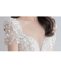 Load image into Gallery viewer, Luxury Short Sleeve Wedding Dress 2023 New Bridal Dress V Neck Beading Shinning Ball Gown Sweep Train
