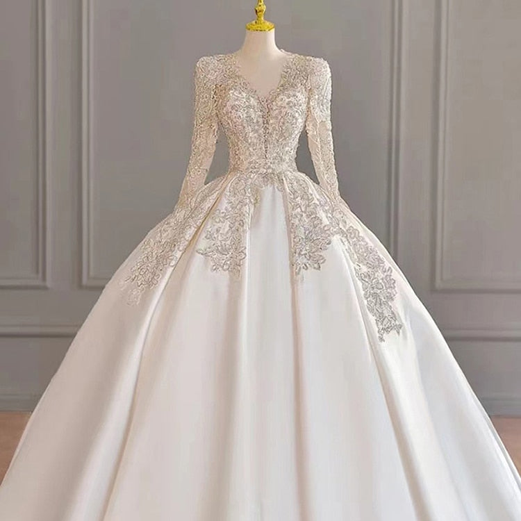 Sexy Backless Wedding Dresses Long Sleeve Satin V-neck Ball Gown