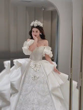 Load and play video in Gallery viewer, Boat Neck Satin Sweep Train Princess Wedding Gown Lace Embroidery
