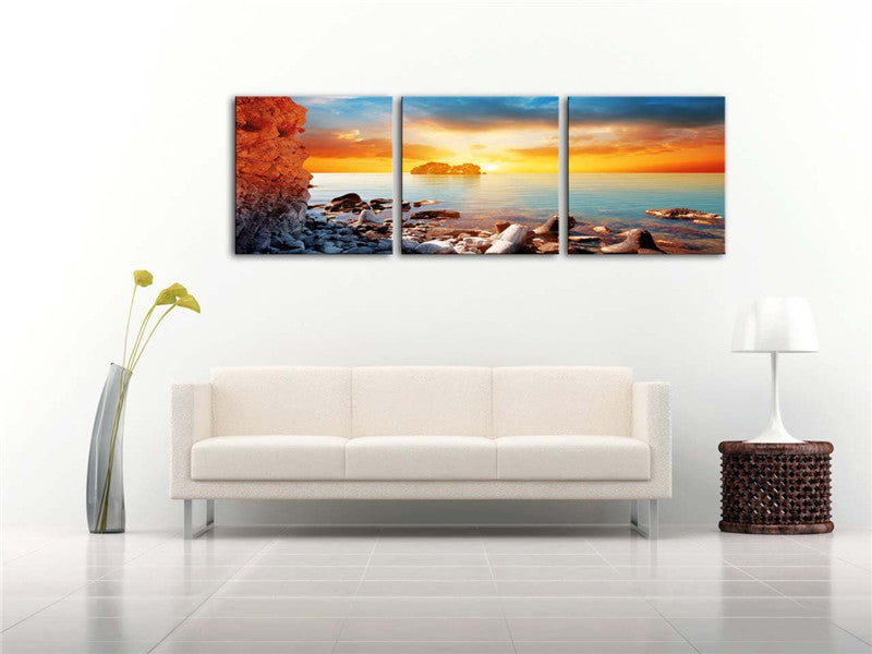 Canvas Print Wall Art Painting Surise On Rock Beach With First Rays Light Blue Ocean Flows Golden Colourful Clouds Paintings